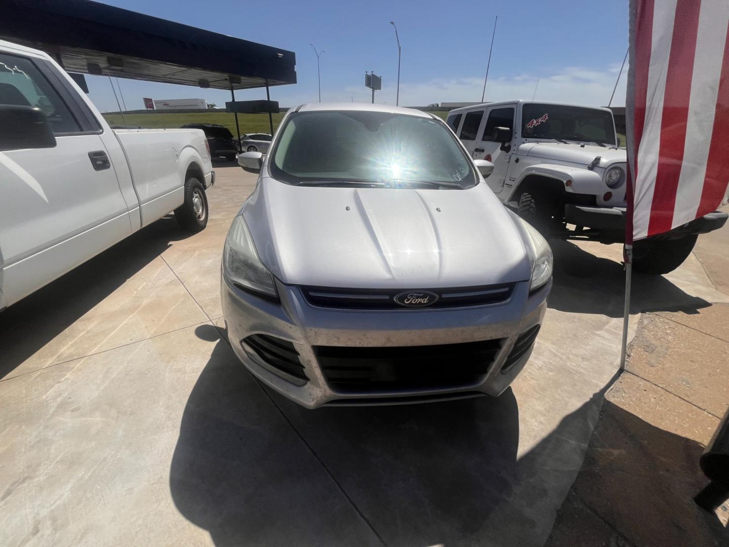 2013 BLACK FORD ESCAPE SEL SEL 4WD (1FMCU9H98DU) with an 2.0L L4 DOHC 16V engine, 6-Speed Automatic transmission, located at 8101 E. Skelly Dr., Tulsa, OK, 74129, (918) 592-3593, 36.121891, -95.888802 - Photo#3